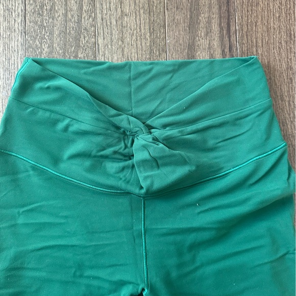 Green Flared Leggings with tie / cross detail on front - Picture 2 of 4